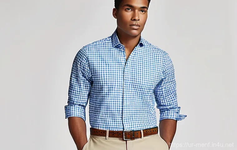 남성의 기본 워드로브 - **Prompt:** A confident young man, aged around 25-30, with a neatly groomed appearance, stands in a ... 남성의 기본 워드로브 - **Prompt:** A confident young man, aged around 25-30, with a neatly groomed appearance, stands in a ...